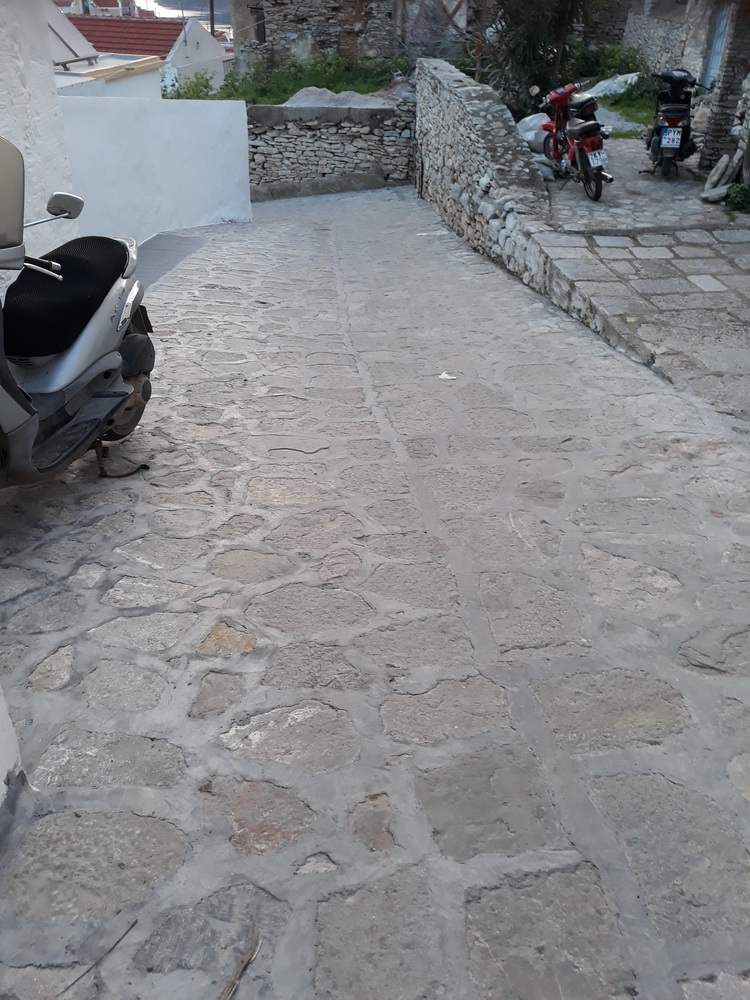 The new path completed to our door. Much easier to walk on than before