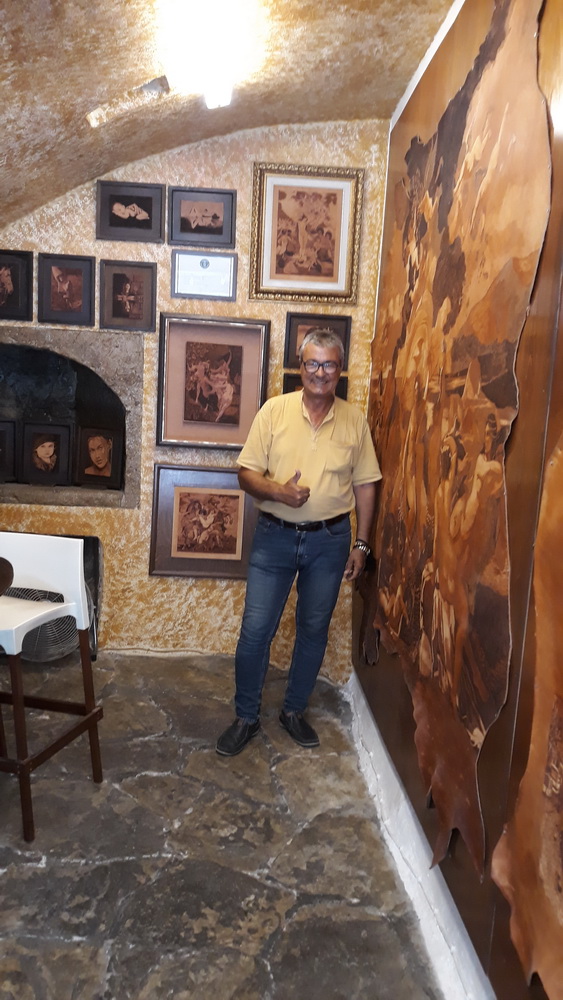 Anniversary present bought from Takis, of course, and below, some of his leather artwork in his studio.