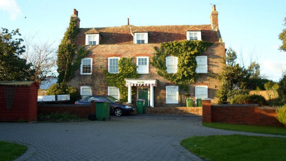 A great house to grow up in (this was after we lived there, and someone else added that hiddeous porch)